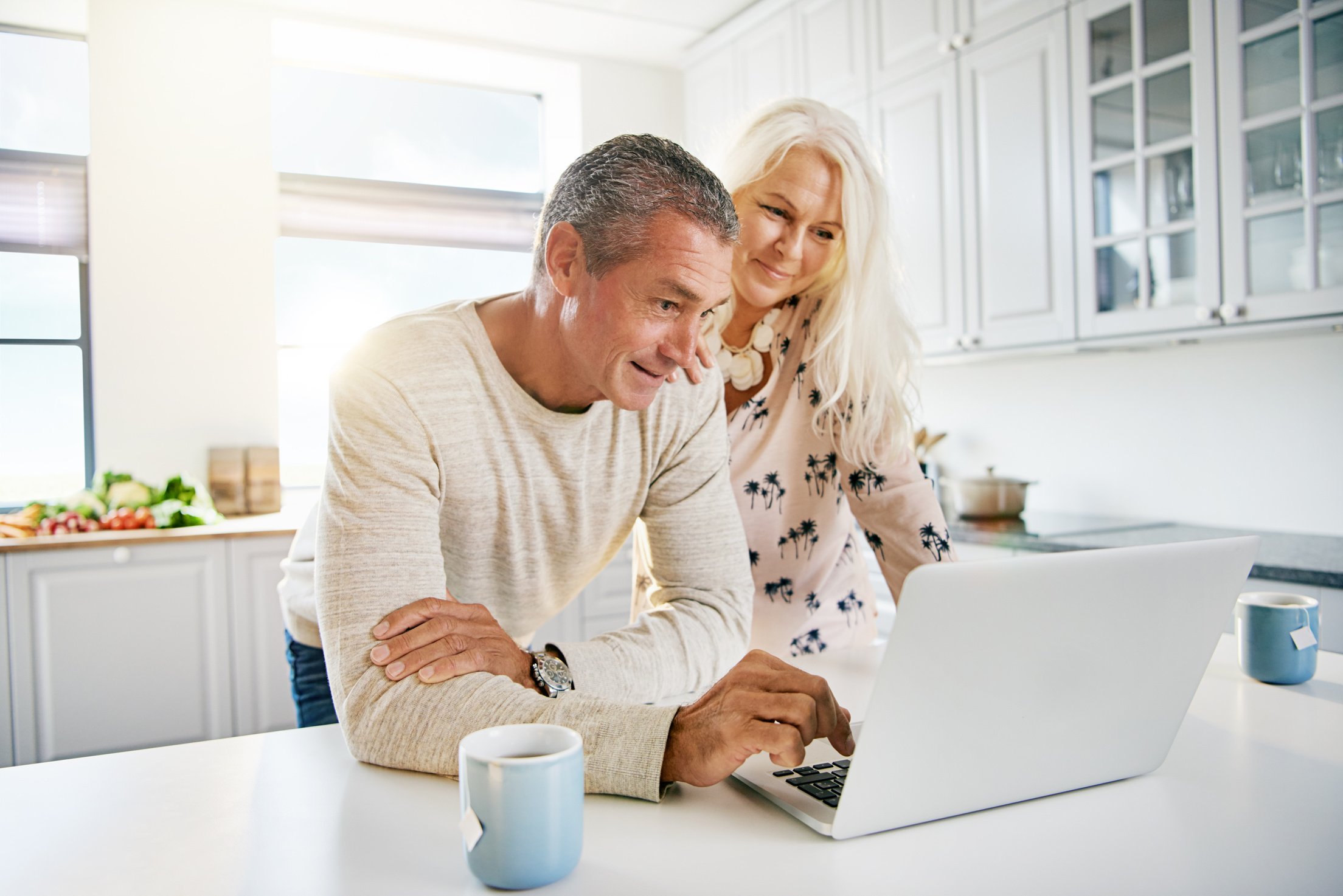 Elderly Retired Couple Reading Their Social Media